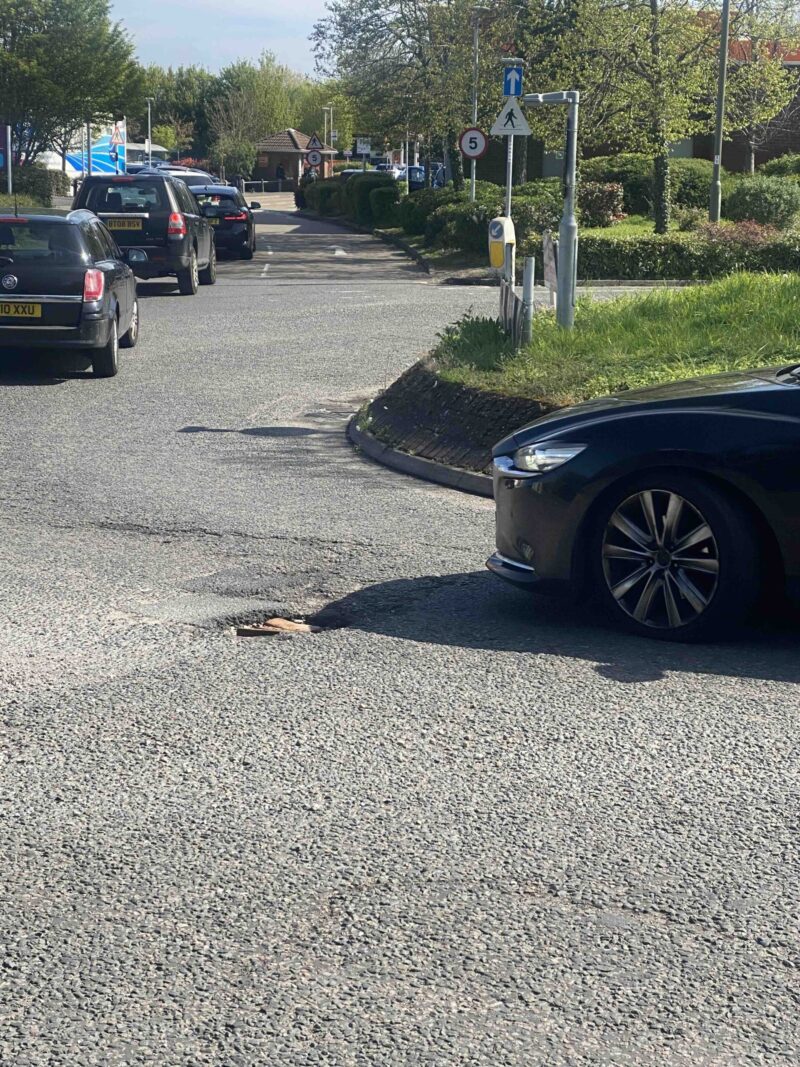 Labour councillors and party members regularly alert and pressure the County Council to fix dangerous potholes (this one by Sainsbury